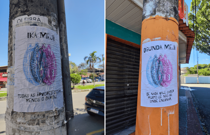Cartazes colados por Goiabeiras, com dicas do enredo da Chegou O Que Faltava para o Carnaval de Vitória 2026.